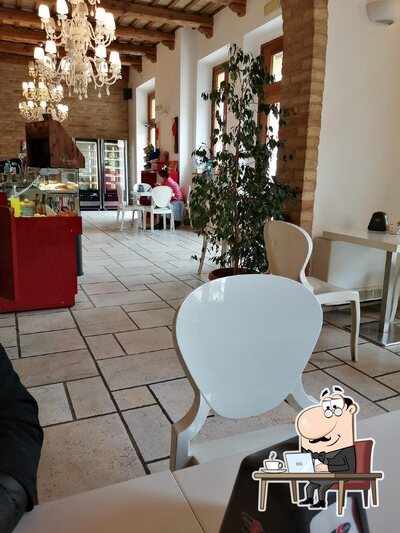 Siediti a un tavolo di Caffe' Pasticceria Prestige