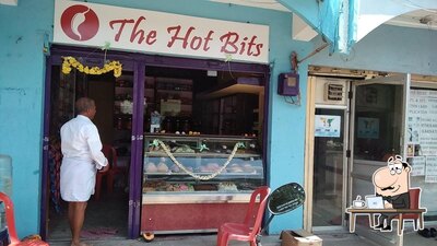 Take a seat at one of the tables at The Hot Bits