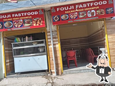 Take a seat at one of the tables at Fouji Fast Food