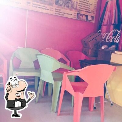 Take a seat at one of the tables at Oye