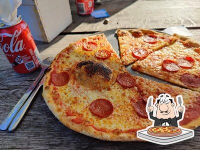 A Den Røde Tomat, vous pouvez profiter des pizzas