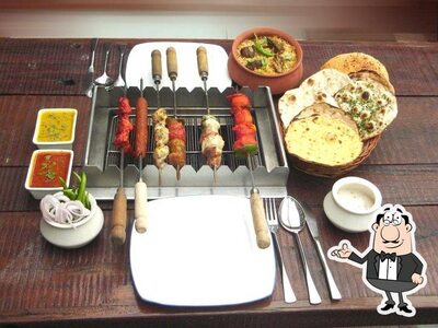 Take a seat at one of the tables at Mirchi