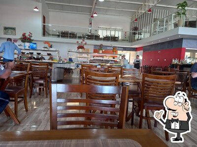 Veja imagens do interior do Churrascaria Saretto