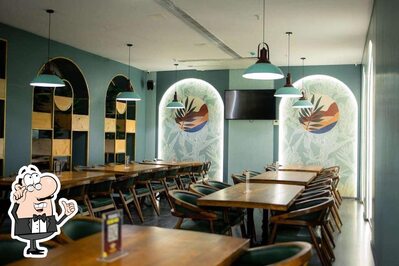 Take a seat at one of the tables at Woop