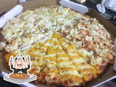 No Recanto - Pizzaria e Petiscaria, você pode degustar pizza
