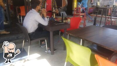 Take a seat at one of the tables at Five Guys Foods