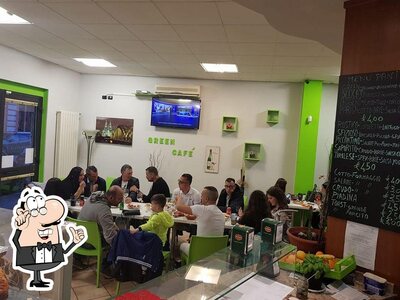 Siediti a un tavolo di Green Cafè