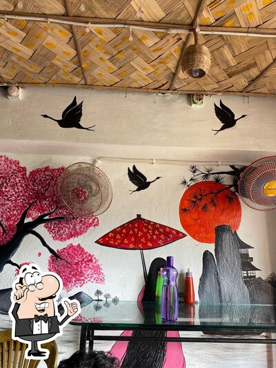 Take a seat at one of the tables at Fly High Cafe