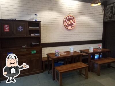 Take a seat at one of the tables at Khan Chacha