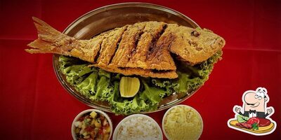 Refeições de carne são oferecidos no Restaurante F. Oliveira