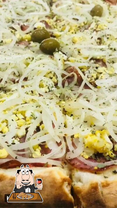 Consiga pizza no Tchelos pizzaria
