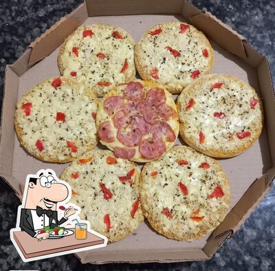 Comida em Pizzaria J.C