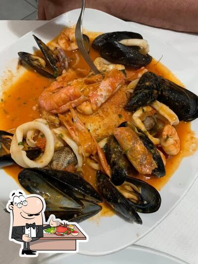 Assaggia i sapori della cucina di mare alla pizzeria Il Quarto di Via Ravizza