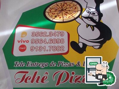 Desfrute da vista da área externa do Tche Pizzas