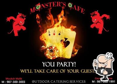 The advertisement displays information about Monster's Cafe