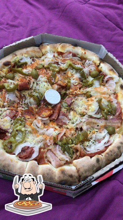No Siracusa Pizzaria, você pode desfrutar de pizza