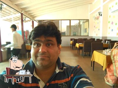 Check out how Curry Leaves Pure Veg Pimpalgaon Restaurant & Banquet Party Hall करी लिव्हस पिंपळगाव looks inside