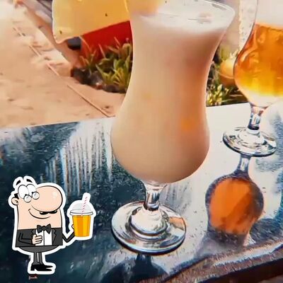 Experimente diferentes bebidas oferecidos no Pousada Coruja Branca