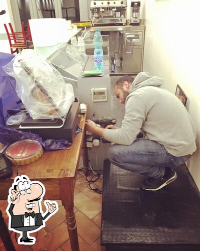 Siediti a un tavolo di Belli de Mamma Rome