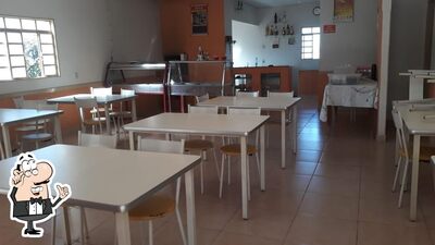 Veja imagens do interior do Pizzaria Xodó