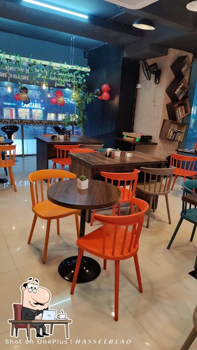 Take a seat at one of the tables at Zippyfeed restaurants - Vapi