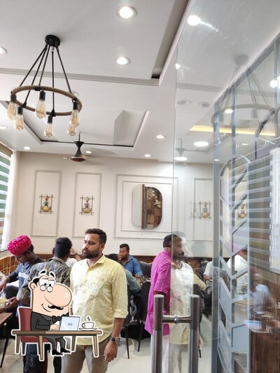 The interior of Padharo sa jain restaurant dharamshala