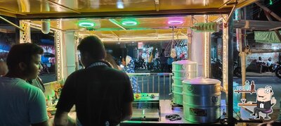 Take a seat at one of the tables at Just try momo