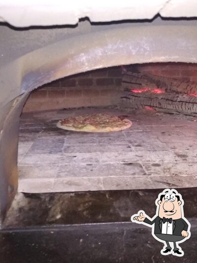 Veja imagens do interior do La Pizza Dom Alex