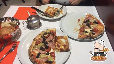 A Pizzeria Capri, puoi prenderti una bella pizza