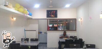 Take a seat at one of the tables at Tandoor Corner Rohit