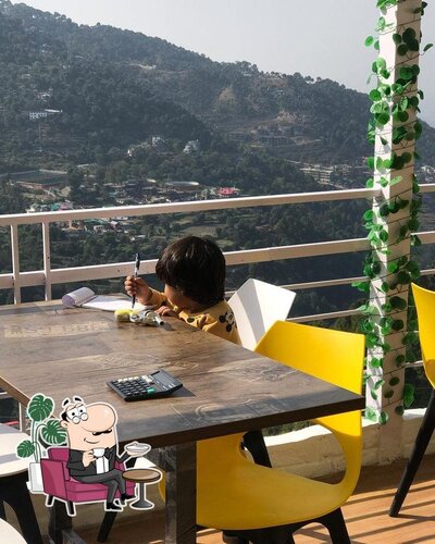 Take a seat at one of the tables at Labu's Kitchen kasauli
