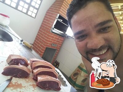 Escolha refeições de carne no Rancho Caroá