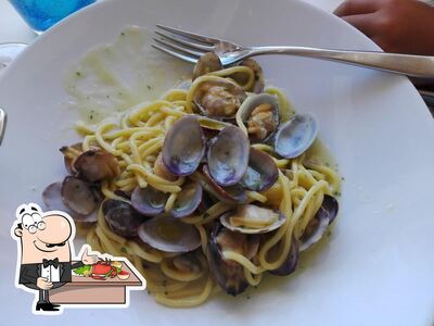 Assaggia i sapori della cucina di mare al ristorante Encanto White Beach Restaurant