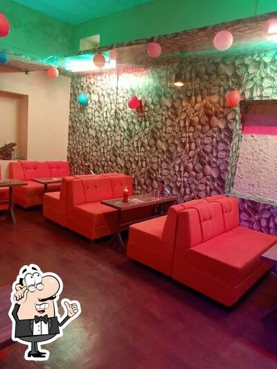 Take a seat at one of the tables at Prembala cafe