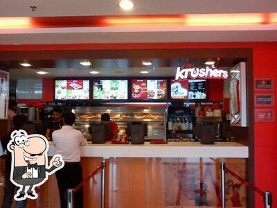 Take a seat at one of the tables at KFC