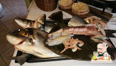 Prenditi la cucina di mare al ristorante Mr. Renzo's Restaurant 