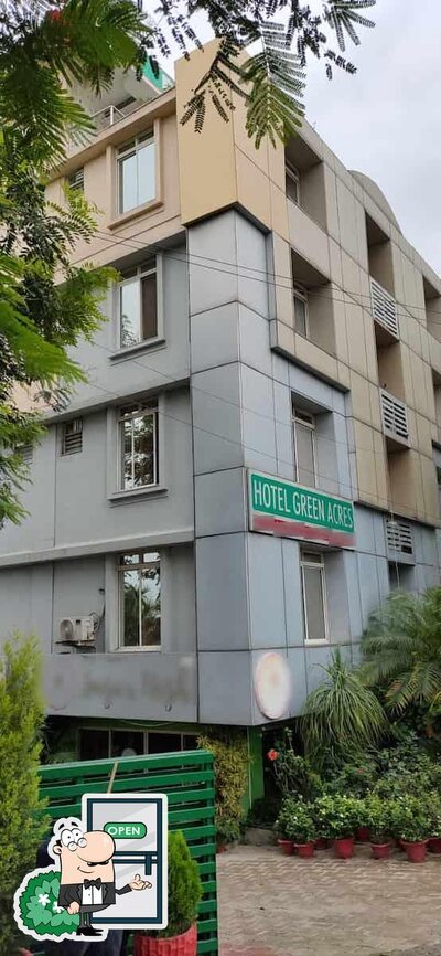 You can get some fresh air at the outside area of Navratna - Hotel Green Acres