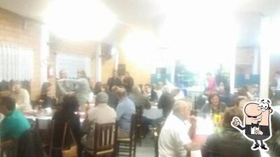 Sente em uma das mesas no Restaurante e Choperia Tipo Caseiro