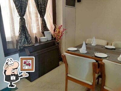 Check out how Navratna - Hotel Green Acres looks inside