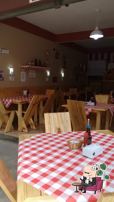 O interior do Restaurante Amor em Pedaços