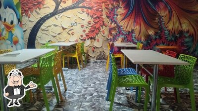 Take a seat at one of the tables at Rose café