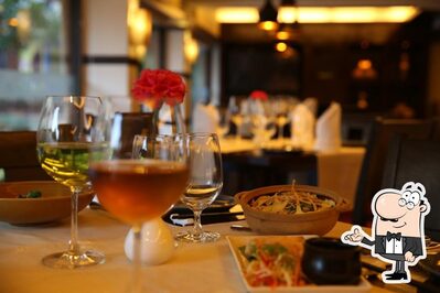 Take a seat at one of the tables at Emperor