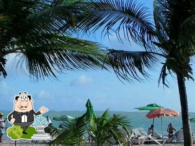 Você pode espairecer no na área externa do Kanoa Beach