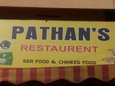 The advertisement shows information about Pathan's Restaurant