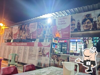 Take a seat at one of the tables at Pillali Canteen