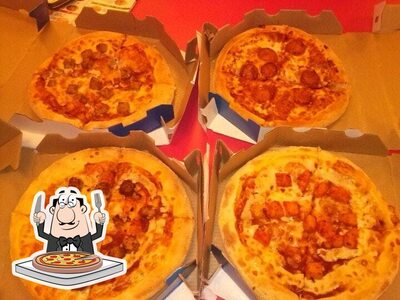 Try out pizza at Domino's Pizza