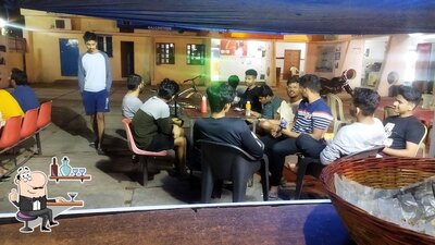 Take a seat at one of the tables at Pillali Canteen