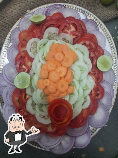 Take a seat at one of the tables at FM Caterers Kitchen