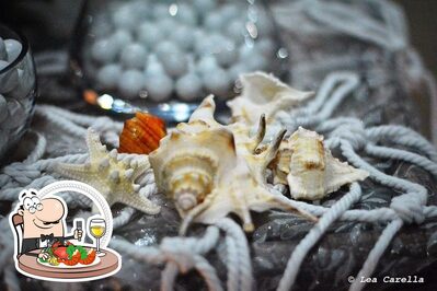 Prenditi la cucina di mare al ristorante Moscabianca