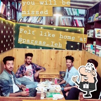 Take a seat at one of the tables at Parsas